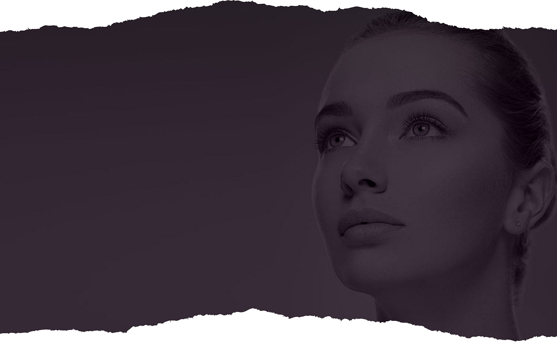 Portrait of a woman looking upwards thoughtfully.