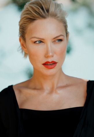 Woman with bold red lips and elegant hairstyle