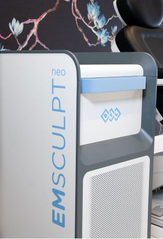 Emsculpt Neo body sculpting machine in clinic.