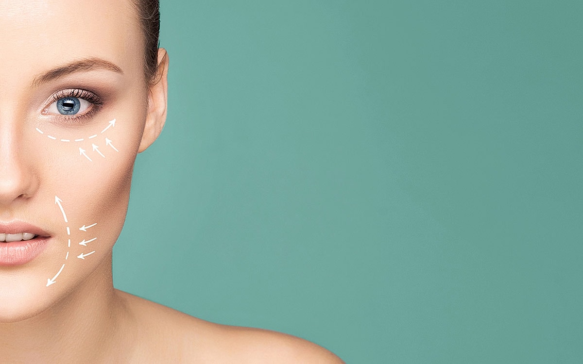 Facial skin treatment with directional arrows illustrated.