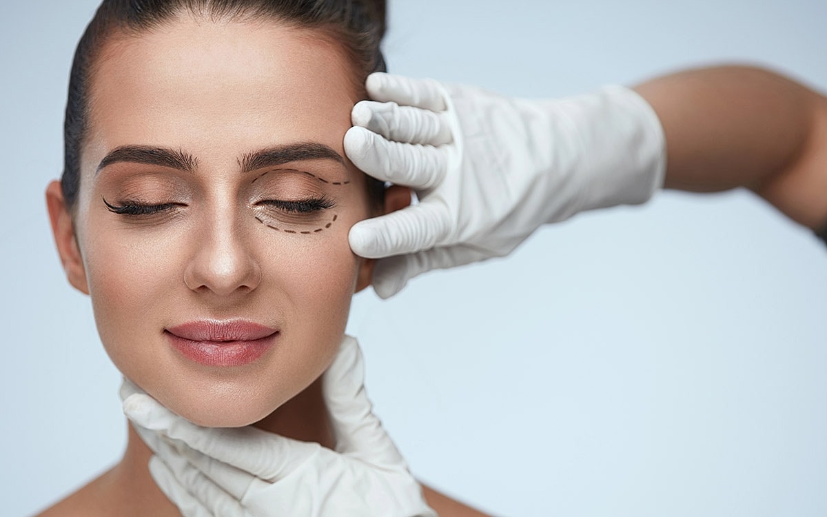 Cosmetic procedure consultation with patient.